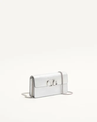 Cartera Vlogo Signature de piel de becerro granulada metalizada con cadena