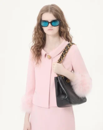 Chaqueta de crepé couture con plumas
