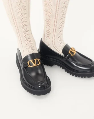Mocasines de piel de becerro con el logotipo VLogo