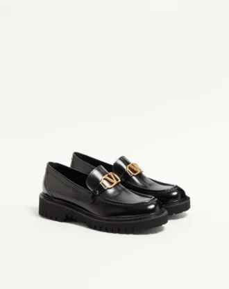 Mocasines de piel de becerro con el logotipo VLogo