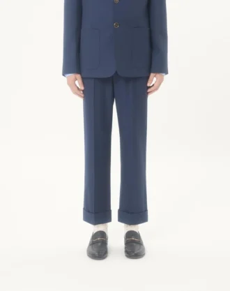 Pantalones de gabardina de lana con vueltas